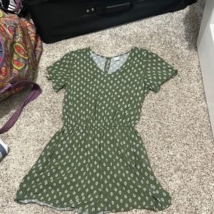 olive green romper with white print